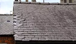 loose slate on old building
